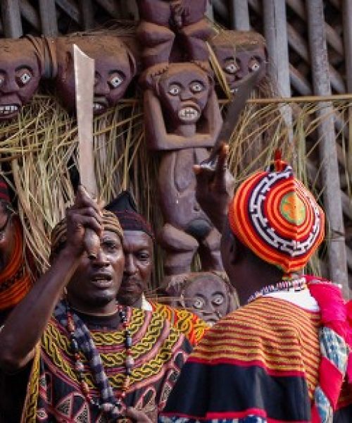 Mandatory Credit: Photo by ETIENNE MAINIMO/EPA-EFE/Shutterstock (9975512b)
Cameroon men from the 'Mfu' secret mens club greet each other with machetes during the Wimbum Cultural Festival in the capital Yaounde, Cameroon 11 November 2018. (issued 12 November 2018) The annual event  was organised by the Wimbum Cultural and Development Association (WICUDA). The festival celebrates traditional customs, music, dance and song. Mbum, Yamba and Mfumnte are the three main ethnic groups that make up Donga Mantung Division in the North West Region of Cameroon. The Mbum people specifically, occupy the Nkambe Plateau and are believed to have migrated into the area from north east Cameroon more than four hundred years ago.
Wimbum Cultural Festival, Yaounde, Cameroon - 11 Nov 2018